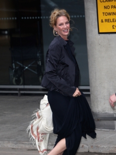Uma Thurman is all smiles before the ARK Gala Dinner on June 4, 2009 in London
