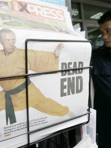Thailand’s Daily XPRESS newspaper reporting the death of David Carradine, is seen at a newsstand in Bangkok, Thailand on June 5, 2009. 
