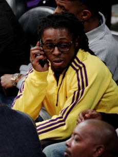 Lil Wayne attends Game One of the NBA Finals between the Los Angeles Lakers and the Orlando Magic at Staples Center on June 4, 2009 in Los Angeles, California