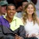 Ellen Pomepo and husband Chris Ivery sit courtside at the Lakers game, May 28, 2009 