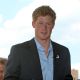 Britain’s Prince Harry speaks to guests at the 2009 Veuve Clicquot Manhattan Polo Classic on Governors Island on May 30, 2009 in New York City