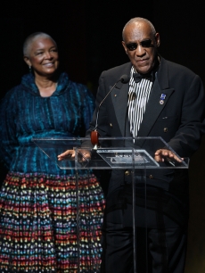 Bill Cosby and his wife Camille Cosby take the stage at the Apollo Theater 75th Anniversary Gala on June 8, 2009 in New York City