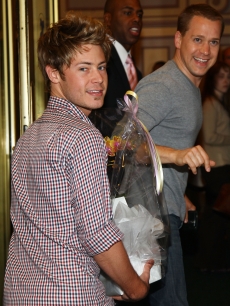 T.R. Knight and boyfriend Mark Cornelsen come bearing gifts at Chandra Wilson’s debut in ‘Chicago’ on Broadway on June 8, 2009 in New York City.
