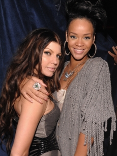 Fergie and Rihanna strike a pose at the official Black Eyed Peas album release party hosted by Target on June 10, 2009 in New York City