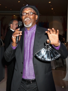 Samuel L. Jackson leads the auction during the Shooting Stars in Desert Nights Benefit 2009 party at the Hurlingham Club on June 11, 2009 in London, England