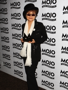 Yoko Ono poses with her Lifetime Achievement award during the 2009 MOJO Honours List at The Brewery on June 11, 2009 in London