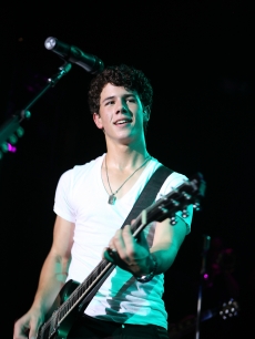 Nick Jonas rocks during a surprise free concert at Irving Plaza on June 11, 2009 in New York City