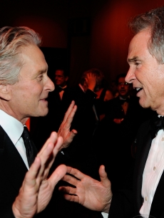 Michael Douglas and Warren Beatty share a laugh at the AFI Life Achievement Award: A Tribute to Michael Douglas after party on June 11, 2009 in Culver City, California