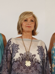 Paris, Kathy, and Nikki Hilton strike a pose during the taping of a commercial for Kathy Hilton’s new makeup line on June 12, 2009 in Studio City, California