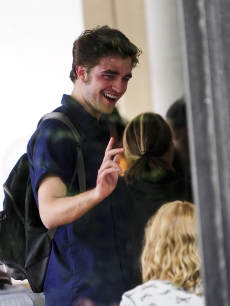 Robert Pattinson and Emilie De Ravin are camera ready while filming a scene for ‘Remember Me’ in Greenwich Village on June 16, 2009 in New York City 