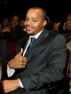 Donald Faison pose for photos in the audience during the 38th annual NAACP Image Awards held at the Shrine Auditorium on March 2, 2007 in Los Angeles, California.