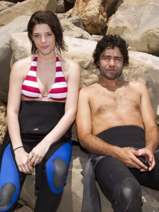 Ashley Greene and Adrian Grenier during the Oakley Learn to Ride fueled by Muscle Milk Surf Camp at Carpinteria State Beach in Carpinteria, CA