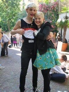 Luke Worrell and Kelly Osbourne pose backstage prior the Frankie Morello show as part of Milan Menswear Fashion Week Spring-Summer 2010 on June 21, 2009