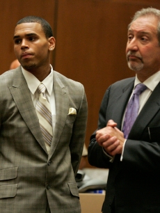 Chris Brown and attorney Mark Geragos appear at a preliminary hearing at Superior Court of Los Angeles County on June 23, 2009 in Los Angeles, California