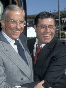Ed McMahon and Jerry Lewis embrace at ‘The American Tail’ for Jerry’s Kids Salute to 25th Anniversary of Universal Studios in May 1990