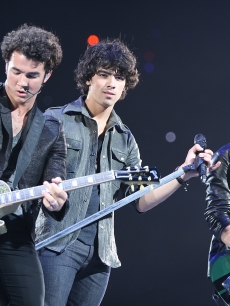 The Jonas Brothers take the stage in Tulsa, Oklahoma on June 22, 2009