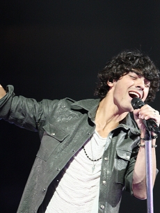 Joe Jonas hits a high note during a performance in Vancouver on June 29, 2009