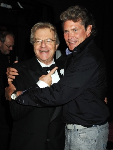 Jerry Springer and David Hasselhoff share a hug during ‘Chicago’ at the Cambridge Theatre in London on July 2, 2009 