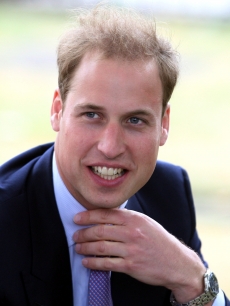 Prince William smiles as he watches children from central London schools participate in team building exercises in London on July 6, 2009 in London, England
