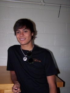 Kiowa Gordon, who will be playing Jacob Black’s friend Embry Call in ‘New Moon’ smiles for a fan photo