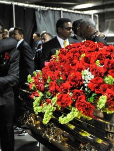 Randy Jackson and Tito Jackson share a hug backstage during Michael Jackson’s public memorial service at the Staples Center on July 7, 2009 in Los Angeles