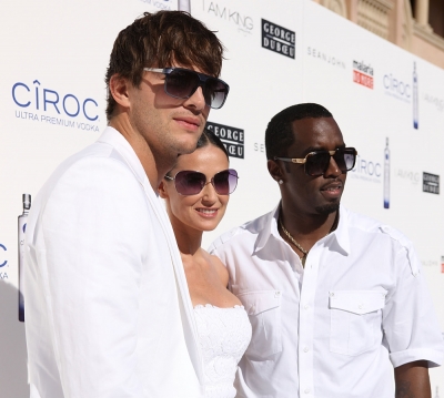 Ashton Kutcher, Demi Moore and Sean ‘Diddy’ Combs at the annual White Party in LA on July 4, 2009