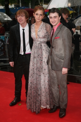 Rupert Grint, Emma Watson and Daniel Radcliffe brave the rain at the world premiere of ‘Harry Potter and the Half Blood Prince’ in London on July 7, 2009 
