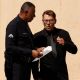 Griffin O’Neal speaks to a policeman outside Farrah Fawcett’s funeral service in Los Angeles, June 30, 2009