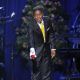 Jermaine Jackson throws a rose on Michael Jackson’s casket after performing ‘Smiles’ at his late brothers public memorial service held at the Staples Center on July 7, 2009 in Los Angeles