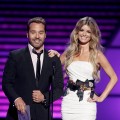 Jeremy Piven and model Marisa Miller share a laugh onstage during the 2009 ESPY Awards in LA on July 15, 2009 