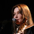Carla Bruni-Sarkozy performs at the dress rehearsal for Mandela Day, a celebration of Nelson Mandela, at Radio Music Hall in New York City on July 18, 2009