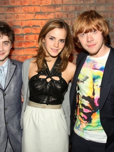 Daniel Radcliff, Emma Watson, and Rupert Grint are all smiles at the ‘Harry Potter and the Half Blood Prince’ premiere after party at Museum of Natural History in New York City on July 9, 2009 