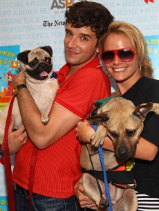 ‘Ugly Betty’ stars Michael Urie and Becki Newton pose at the 11th Annual Broadway Barks event in Shubert Theatre in New York City on July 11, 2009 