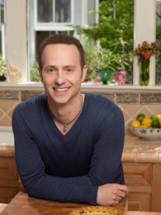 Brian Boitano poses in the kitchen for ‘What Would Brian Boitano Make’