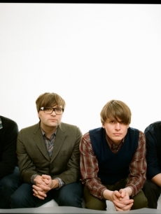 The Death Cab For Cutie dudes pose for a portrait