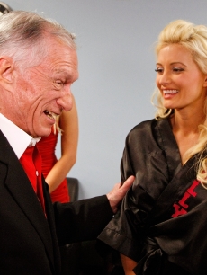 Hugh Hefner and ex Holly Madison share a moment after her perofrmance in ‘Peepshow’ at Planet Hollywood in Las Vegas on July 18, 2009