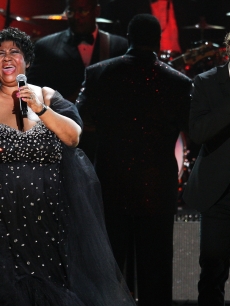 Josh Groban and Aretha Franklin take the stage during the Mandela Day Celebration Concert at Radio City Music Hall in New York City on July 18, 2009 