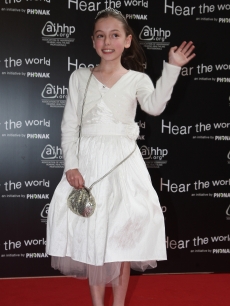 Hollie Steele, a former ‘Britain’s Got Talent’ contender, attends the Bryan Adams ‘Hear The World Ambassadors’ exhibition at Saatchi Gallery in London on July 21, 2009