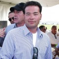 Jon Gosselin poses for a picture with Michael Lohan in the background at the 2009 Mercedes-Benz Polo Challenge in Bridgehampton, New York