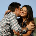 Mila Kunis gets a hug from co-star Jason Bateman at the ‘Extract’ panel at San Diego Comic-Con on July 25, 2009