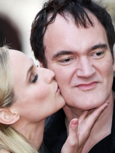 Diane Kruger kisses director Quentin Tarantino on the cheek during the London permiere of ‘Inglourious Basterds’ at the Odeon Leicester Square on July 23, 2009