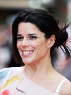 Neve Campbell is all smiles at the London premiere of ‘Inglourious Basterds’ at the Odeon Leicester Square on July 23, 2009