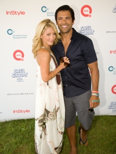 Kelly Ripa and Marc Consuelos strike a pose at QVC’s Super Saturday Live at Nova’s Ark Project in Water Mill, New York, on August 1, 2009