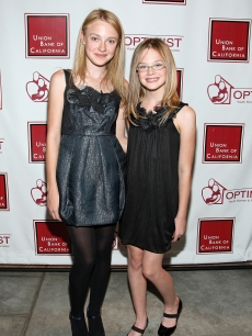 Dakota Fanning and Elle Fanning arrive at The Optimist Youth Homes & Family Services’ 2008 Mentor Awards Dinner and Fashion Show held at the Globe Theater in Universal City, California on October 22, 2008 