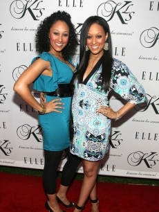 Tamera Mowry and Tia Mowry arrive at Kimora Lee Simmons Debuts KLS Collection paty at the Hollywood Social in Hollywood on March 23, 2006 