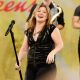 Kelly Clarkson rocks out during a performance on ABC’s ‘Good Morning America,’ Central Park, New York City, July 31, 2009